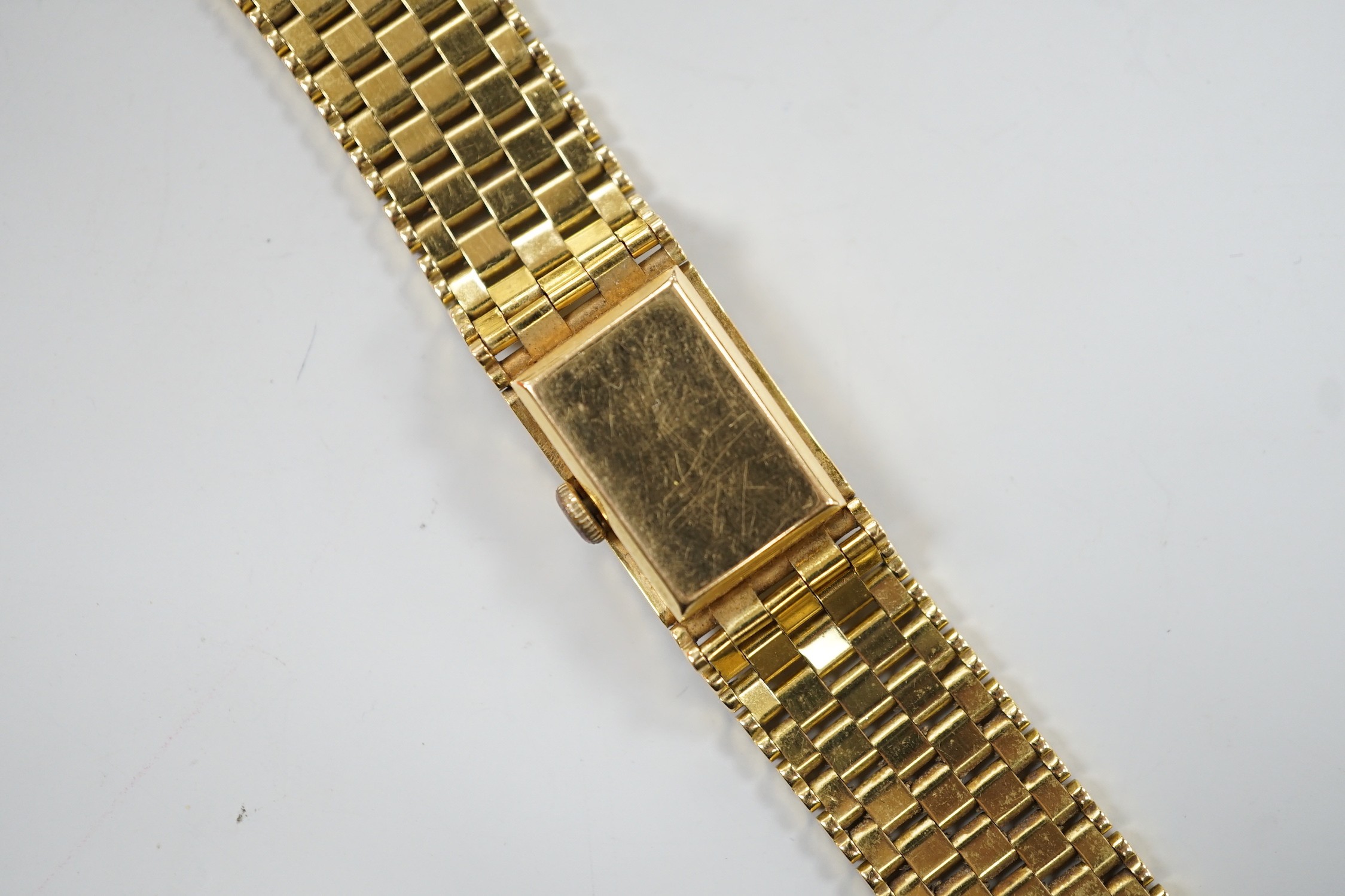 A lady's 18ct gold Girard Perregaux manual wind bracelet watch, overall 17.5cm, gross weight 44.6 grams.